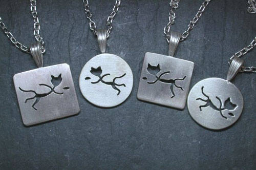 Pounce Pendants